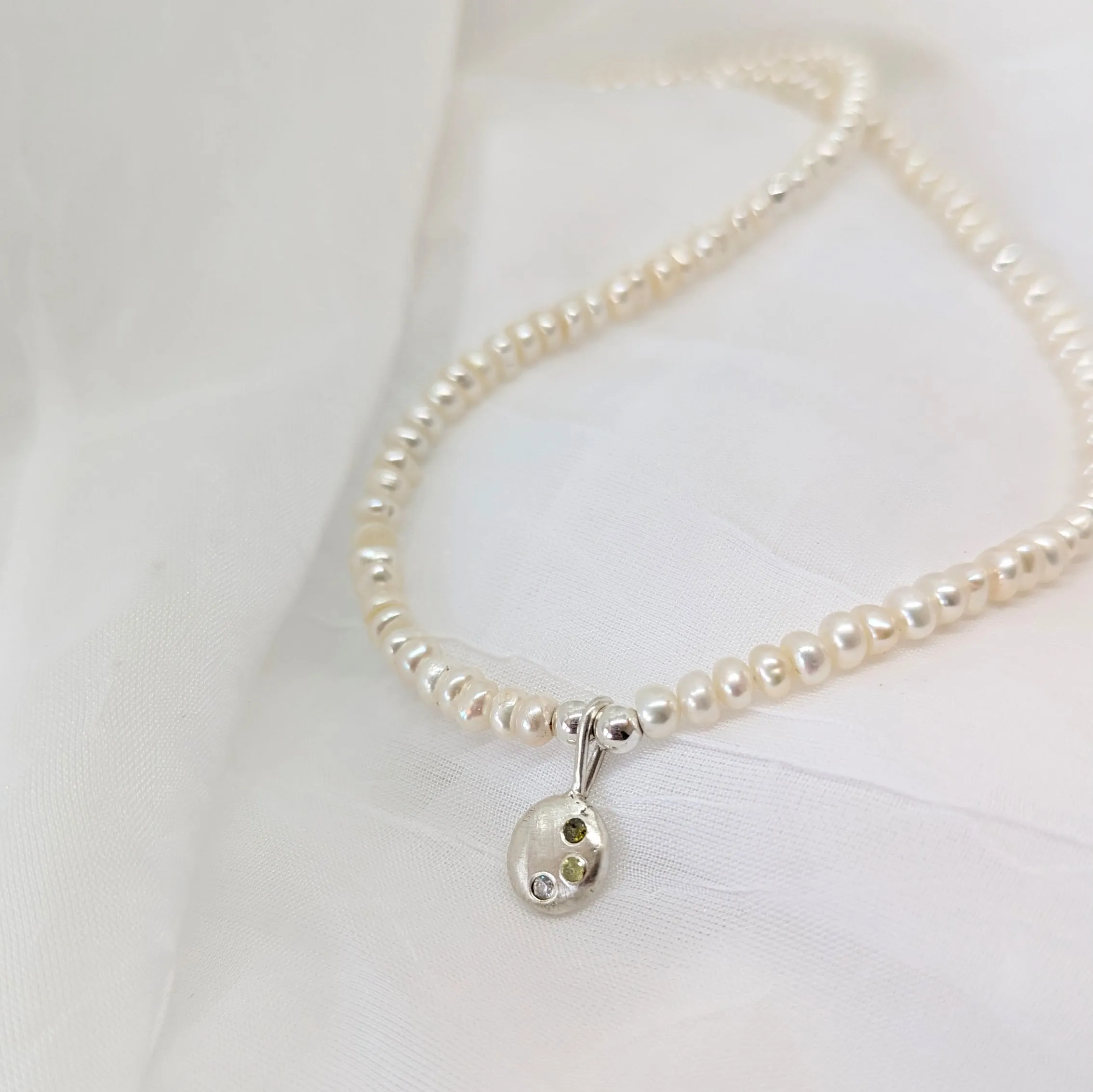 Pearl Necklace with Silver Pebble Pendant